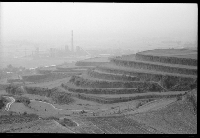 Terraced Farmland with Powerplant
