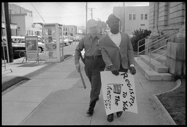 Jim Clark arrests a protester on Freedom Day